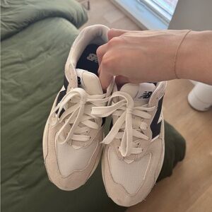 New Balance Cream and Black Sneakers